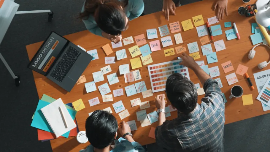 time-lapse-business-team-looking-laptop-screen-sharing-idea-symposium (1)