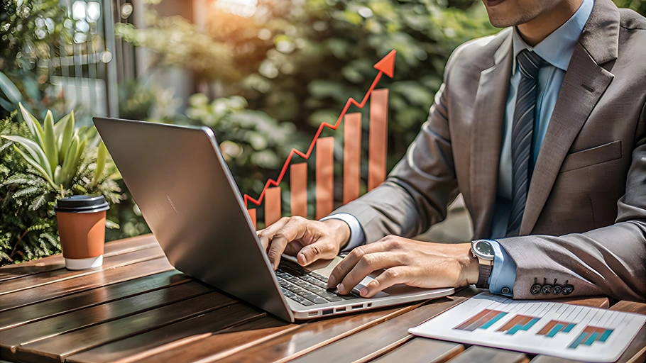business man use laptop to see the difference between odoo vs. hubspot
